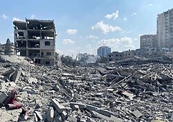 First place: The aftermath of an Israeli airstrike in Gaza City on October 9, 2023, leaving widespread destruction in the Rimal area. Attribution: WAFA (Q2915969) / CC-BY-SA 3.0